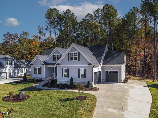 view of front facade with a garage and a front lawn