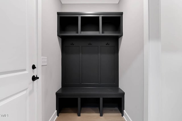 mudroom with light hardwood / wood-style floors