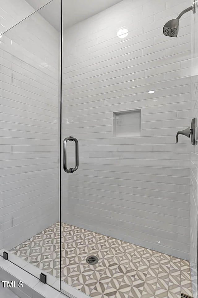 bathroom with an enclosed shower