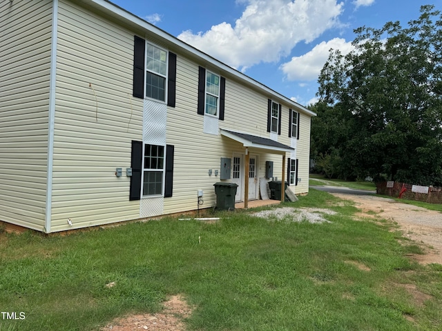 exterior space with a front yard