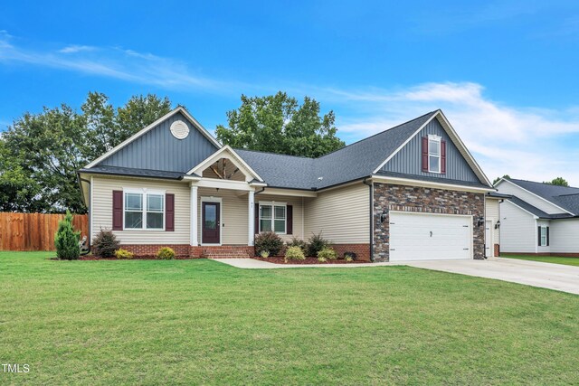 craftsman inspired home with a front yard