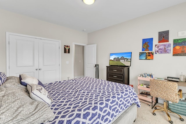 carpeted bedroom with a closet