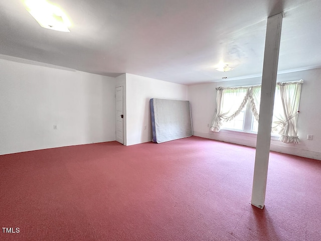 spare room featuring carpet