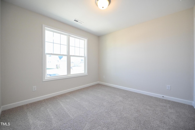 empty room with carpet floors