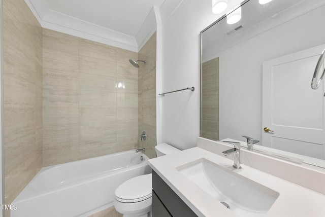 full bathroom with ornamental molding, vanity, toilet, and tiled shower / bath