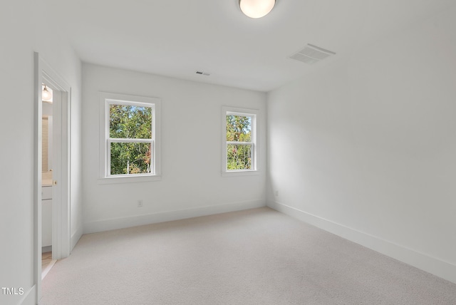 view of carpeted spare room