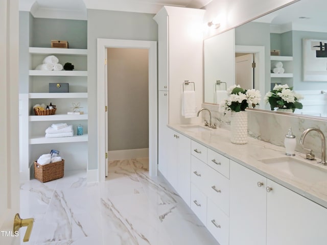 2506 Silas Peak Ln, Apex, NC 27523 - full bath featuring double vanity, built in shelves, marble finish flooring, and baseboards