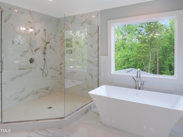 2506 Silas Peak Ln, Apex, NC 27523 - bathroom featuring a soaking tub, a sink, a marble finish shower, and marble finish flooring