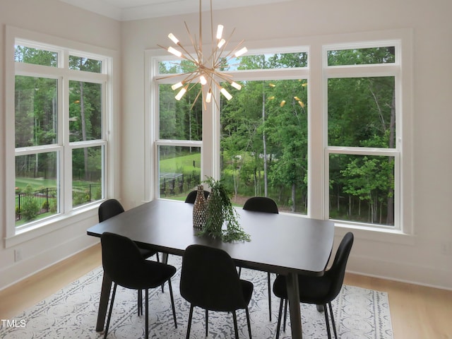 2506 Silas Peak Ln, Apex, NC 27523 - dining space with a chandelier, plenty of natural light, and baseboards