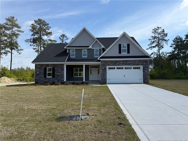 3013 Deeside Ct, Fayetteville, NC 28306 - craftsman-style house with a front lawn, concrete driveway, an attached garage, covered porch, and stone siding