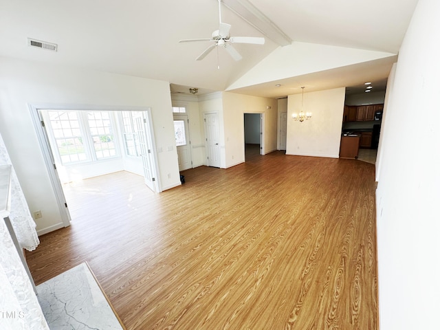 4712 Fox Fern Ln, Raleigh, NC 27604 - unfurnished living room featuring a chandelier, light wood-style floors, ceiling fan, and baseboards