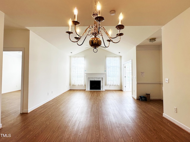 4712 Fox Fern Ln, Raleigh, NC 27604 - unfurnished living room with a chandelier, wood finished floors, lofted ceiling, a fireplace, and baseboards