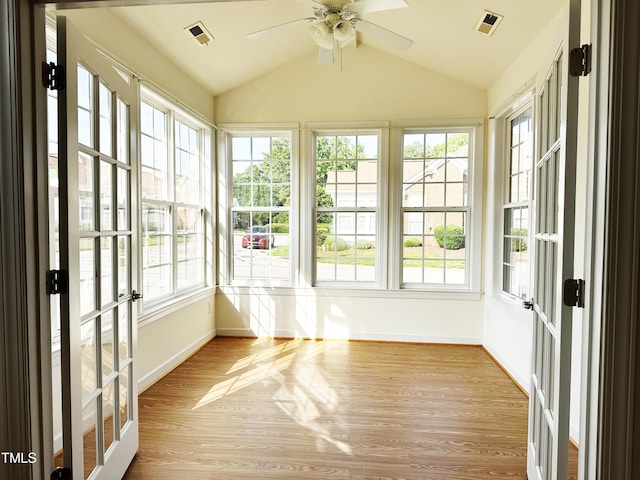4712 Fox Fern Ln, Raleigh, NC 27604 - unfurnished sunroom featuring french doors, plenty of natural light, wood finished floors, and lofted ceiling