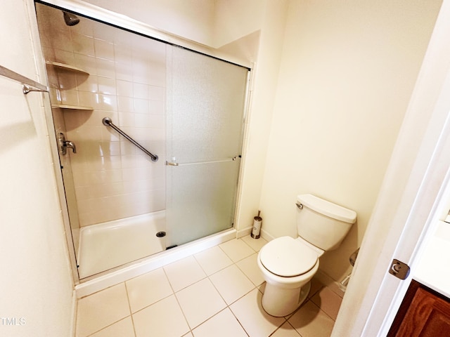 4712 Fox Fern Ln, Raleigh, NC 27604 - full bath featuring toilet, a stall shower, tile patterned floors, and baseboards