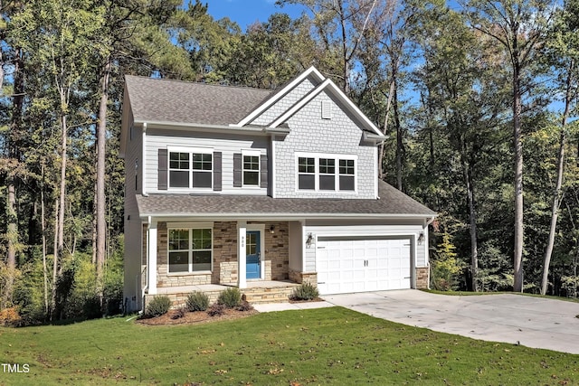 craftsman inspired home with a garage and a front lawn