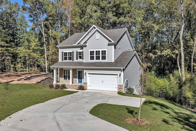 view of front of property featuring a garage, stone siding, a shingled roof, concrete driveway, and a front yard