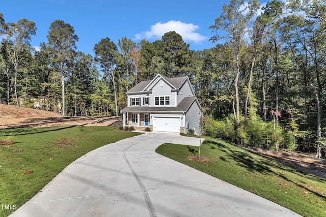 view of front of home featuring a garage and a front lawn