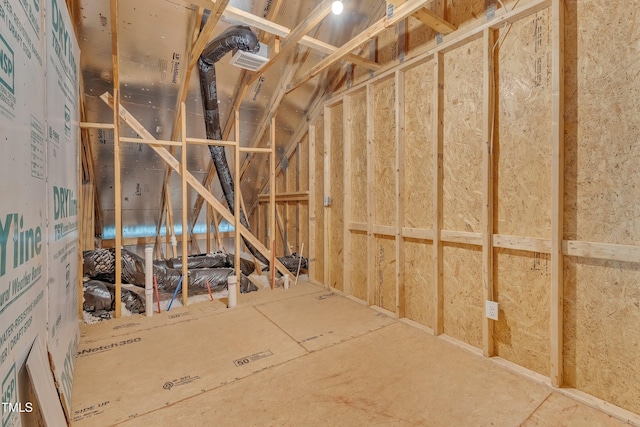 misc room with lofted ceiling