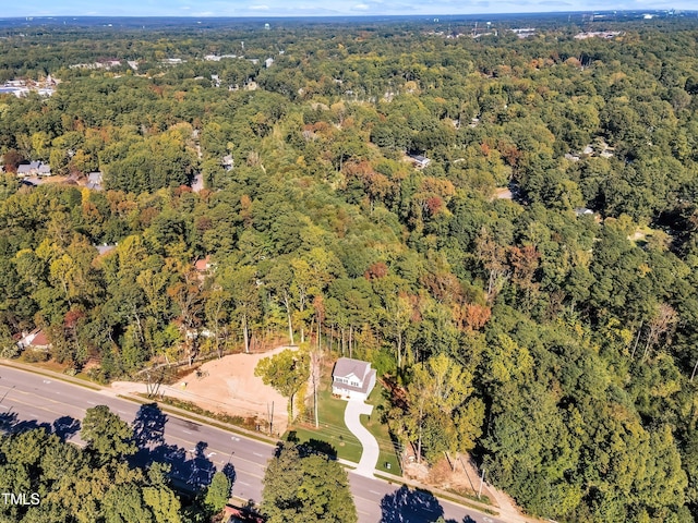 aerial view with a wooded view
