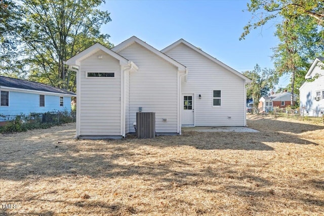 back of property with central AC unit