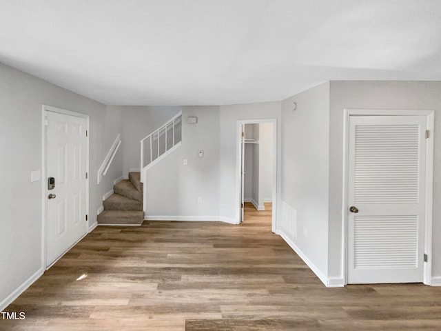 foyer with hardwood / wood-style flooring