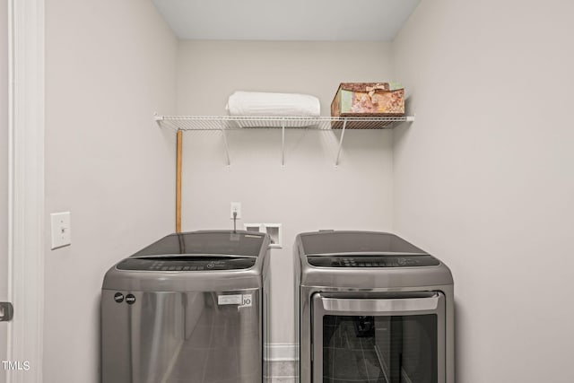 laundry area featuring separate washer and dryer