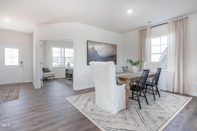 dining area with plenty of natural light, dark wood finished floors, visible vents, and recessed lighting