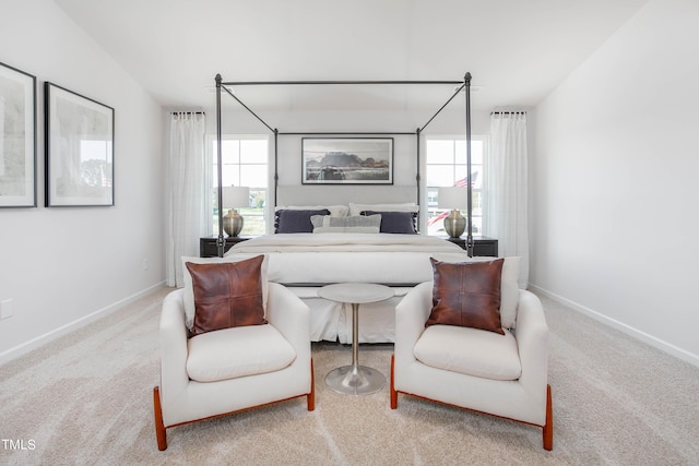 carpeted bedroom with baseboards