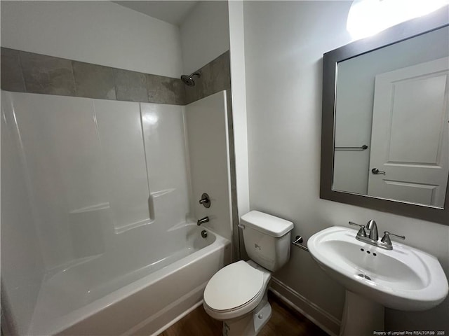 full bathroom with toilet, tub / shower combination, and sink