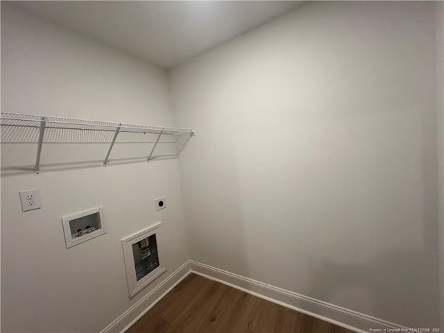 washroom with electric dryer hookup, dark wood-type flooring, and washer hookup