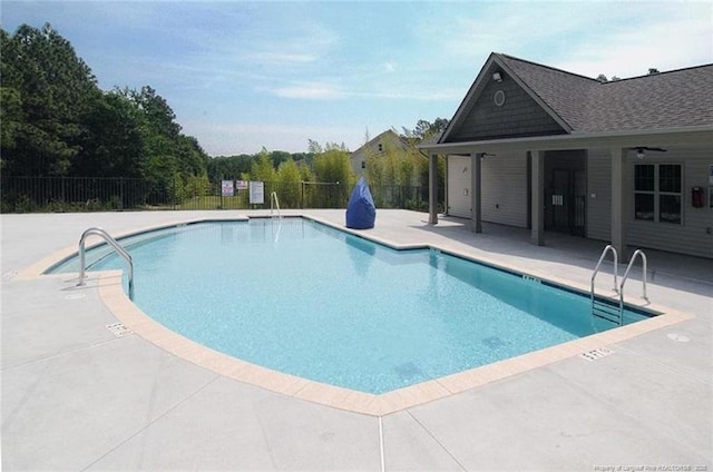 view of pool featuring a patio