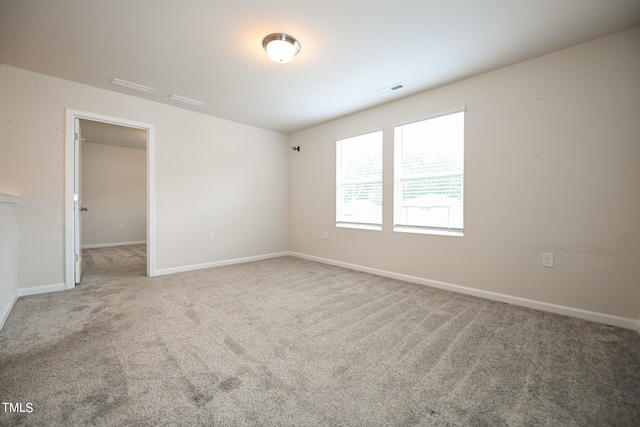 spare room with carpet