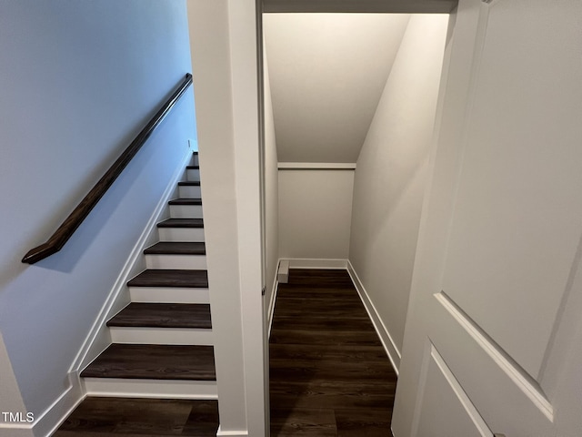 stairway featuring hardwood / wood-style flooring