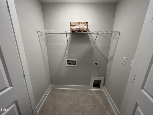 washroom with hookup for a washing machine, hookup for an electric dryer, and tile patterned floors