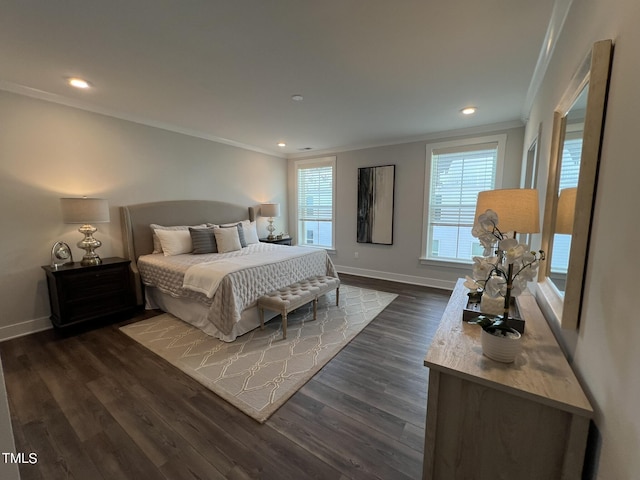 bedroom featuring ornamental molding and dark hardwood / wood-style floors