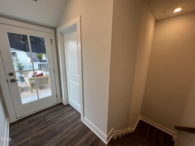 entryway with dark wood-type flooring