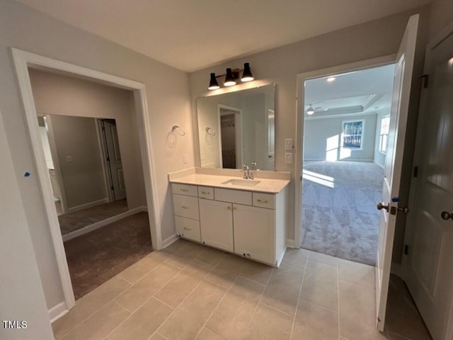 bathroom with tile patterned flooring and vanity