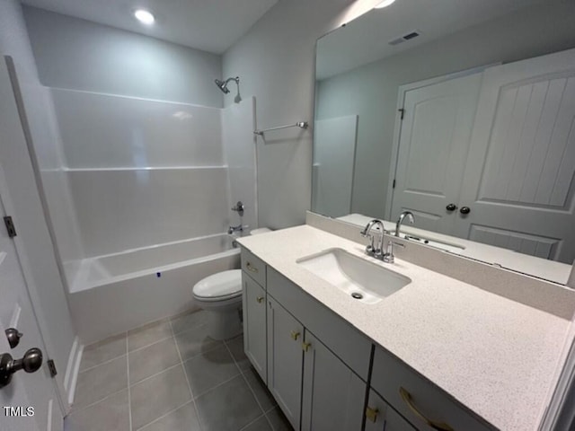 full bathroom featuring tile patterned flooring, vanity, toilet, and shower / washtub combination