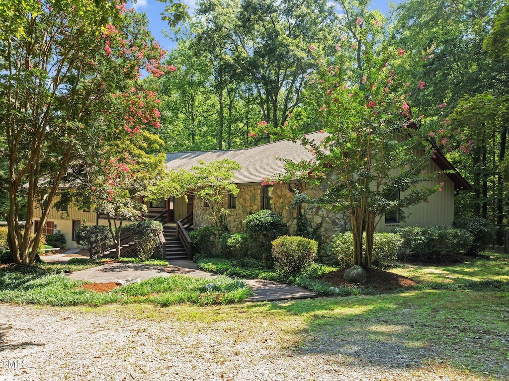 exterior space featuring a front lawn