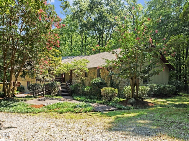 exterior space featuring a front lawn