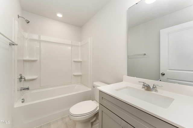 full bathroom featuring shower / bathtub combination, toilet, tile patterned floors, and vanity