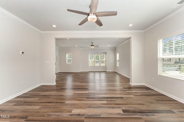 unfurnished living room with ceiling fan, hardwood / wood-style flooring, crown molding, and a healthy amount of sunlight