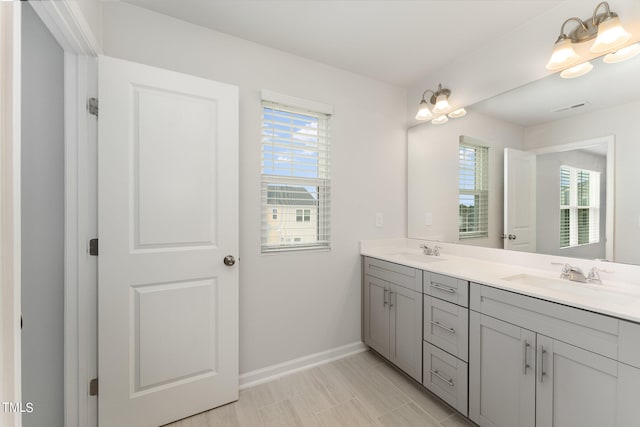 bathroom with vanity and tile patterned floors