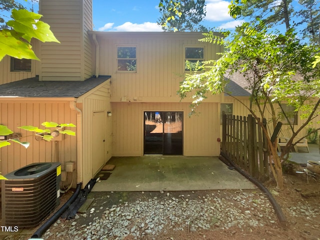 exterior space with a patio area and central air condition unit