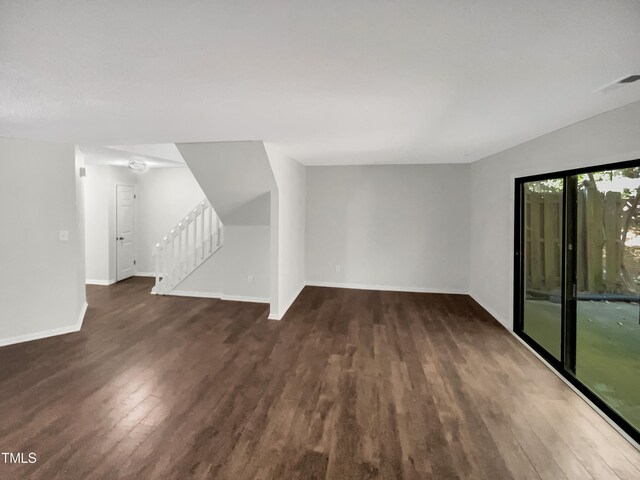 interior space with dark hardwood / wood-style flooring