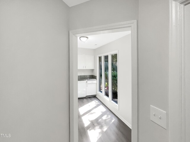 hall with light wood-type flooring