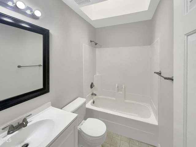 full bathroom with vanity,  shower combination, toilet, and a skylight