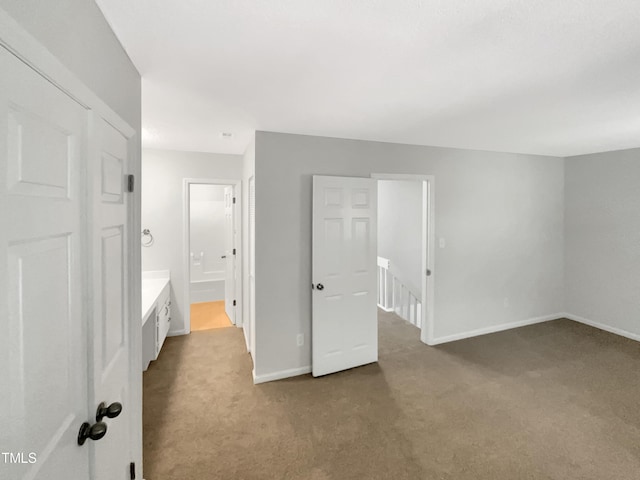 unfurnished bedroom featuring carpet