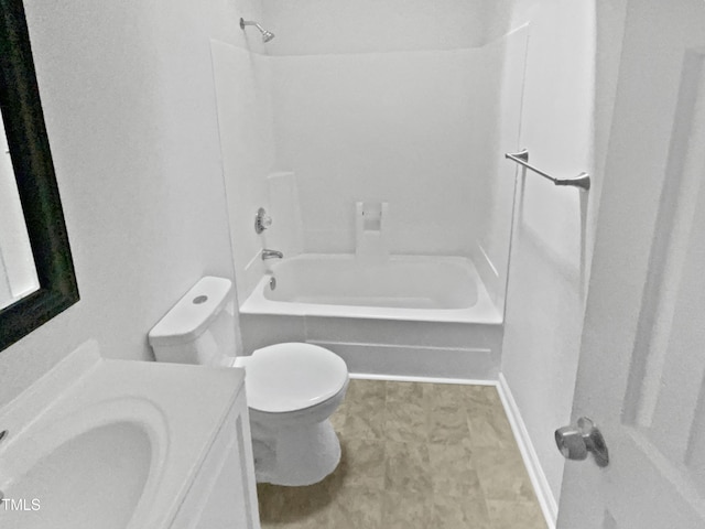 full bath featuring toilet, baseboards, vanity, and bathtub / shower combination