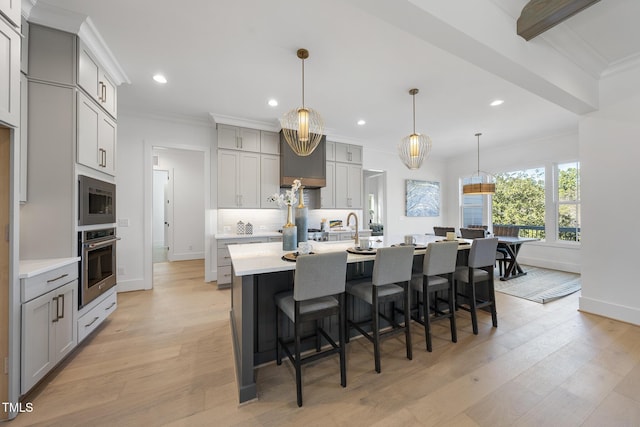 kitchen with stainless steel appliances, ornamental molding, light countertops, and decorative backsplash